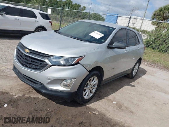 2018 Chevrolet Equinox LS with VIN 2GNAXHEV1J6110087, listed as a IAAI auction lot 42175959 with 124,611 mi miles and . Bid and sale history available at DreamBid. Image 17.