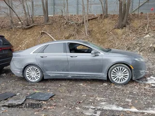 2015 Lincoln MKZ with VIN 3LN6L2J97FR616714, listed as a IAAI auction lot 41664184 with 116,495 mi miles and . Bid and sale history available at DreamBid. Image 13.