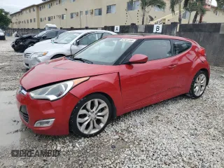 2012 Hyundai Veloster w/Gray Int с VIN KMHTC6AD1CU064985, выставлен на аукционе Copart как лот 42487355 с пробегом 84 475 миль миль и Списание • Salvage title. История ставок и продаж доступна на DreamBid. Изображение 1.
