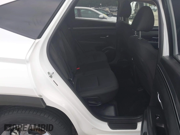 2023 Hyundai Tucson SEL with VIN 5NMJBCAE1PH201717, listed as a IAAI auction lot 42481210 with 55,943 mi miles and . Bid and sale history available at DreamBid. Image 8.