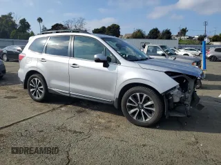2017 Subaru Forester Touring with VIN JF2SJGWC2HH539654, listed as a Copart auction lot 88998765 with 89,654 mi miles and Salvage Title. Bid and sale history available at carsss.com. Image 4.