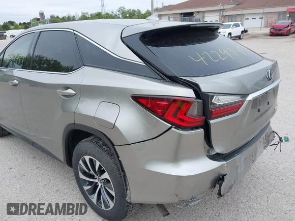 2022 Lexus RX 350 with VIN 2T2AZMDA7NC352957, listed as a IAAI auction lot 42297457 with 34,576 mi miles and . Bid and sale history available at DreamBid. Image 19.