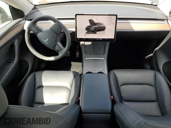 2023 Tesla Model Y Long Range z VIN 7SAYGAEE7PF714828, wystawiony jako Copart lot #89210485 z przebiegiem 42 256 mil mil oraz Szkoda całkowita • Salvage title. Historia ofert i sprzedaży dostępna na DreamBid. Obrazek 8.