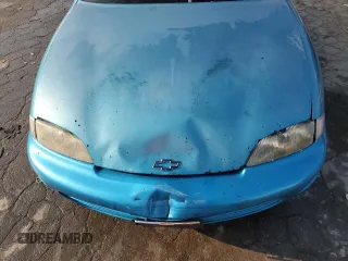 1999 Chevrolet Cavalier z VIN 1G1JC1240X7138164, wystawiony jako Copart lot #70324134 z przebiegiem 256 856 mil mil oraz Szkoda całkowita • Salvage title. Historia ofert i sprzedaży dostępna na DreamBid. Obrazek 11.