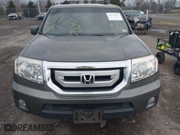 2009 Honda Pilot EX-L with VIN 5FNYF48679B024912, listed as a IAAI auction lot 41137972 with 286,469 mi miles and . Bid and sale history available at carsss.com. Image 12.
