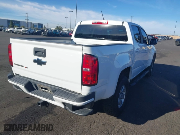 2019 Chevrolet Colorado 2WD Work Truck with VIN 1GCGSBEN0K1144041, listed as a IAAI auction lot 41668092 with 124,017 mi miles and . Bid and sale history available at DreamBid. Image 14.