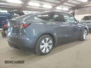 2023 Tesla Model Y Long Range z VIN 7SAYGDEE6PA179733, wystawiony jako Copart lot #58399015 z przebiegiem 45 780 mil mil oraz Szkoda całkowita • Salvage title. Historia ofert i sprzedaży dostępna na DreamBid. Obrazek 3.