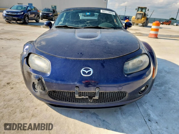 2007 Mazda MX-5 Miata Touring with VIN JM1NC25F770138120, listed as a Copart auction lot 60777425 with 184,029 mi miles and Salvage title. Bid and sale history available at DreamBid. Image 5.