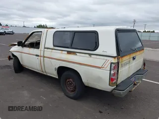 1986 Nissan Hardbody E with VIN JN6ND11S7GW015213, listed as a IAAI auction lot 42588949 with 235,145 mi miles and . Bid and sale history available at DreamBid. Image 3.