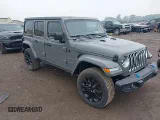2023 Jeep Wrangler Sahara with VIN 1C4JJXP6XPW698886, listed as a IAAI auction lot 42439690 with 41,787 mi miles and . Bid and sale history available at DreamBid. Image 1.