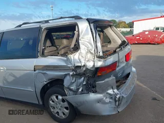 2003 Honda Odyssey EX-L with VIN 5FNRL18973B007802, listed as a IAAI auction lot 40365765 with 278,759 mi miles and . Bid and sale history available at DreamBid. Image 6.