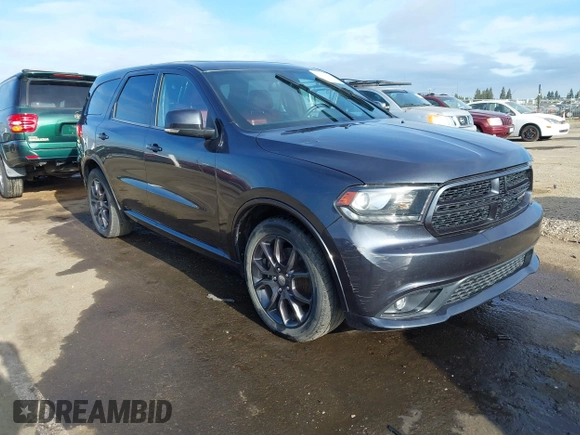 2015 Dodge Durango R/T with VIN 1C4SDJCT1FC188401, listed as a IAAI auction lot 42124652 with 86,339 mi miles and . Bid and sale history available at carsss.com. Image 1.