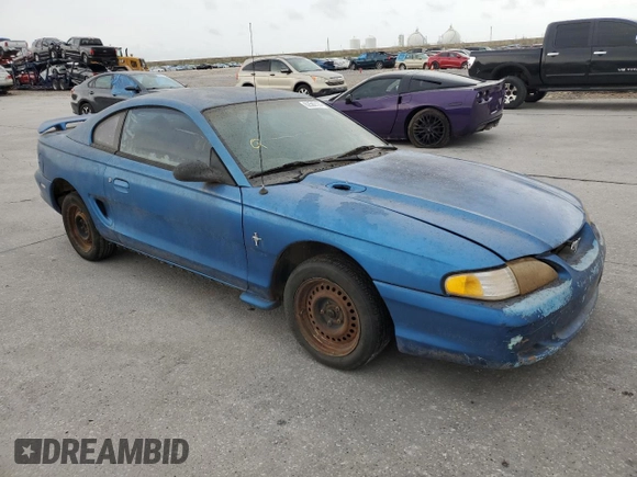 1995 Ford Mustang with VIN 1FALP4045SF145706, listed as a Copart auction lot 69829614 with 164,460 mi miles and Salvage Title. Bid and sale history available at carsss.com. Image 4.