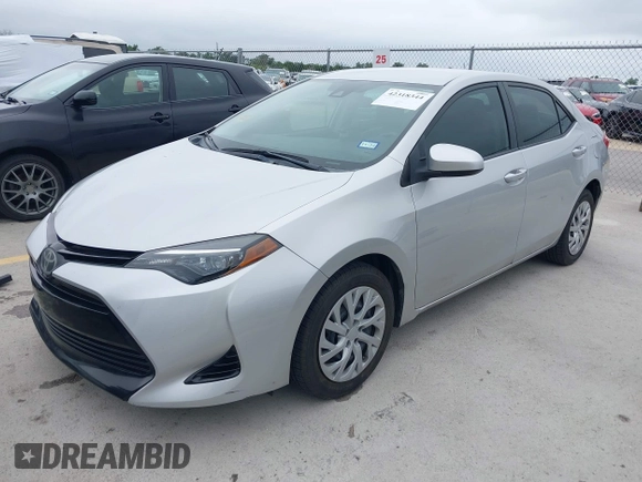 2018 Toyota Corolla L z VIN 5YFBURHE7JP822870, wystawiony jako IAAI lot #42318344 z przebiegiem 118 519 mil mil oraz . Historia ofert i sprzedaży dostępna na DreamBid. Obrazek 18.