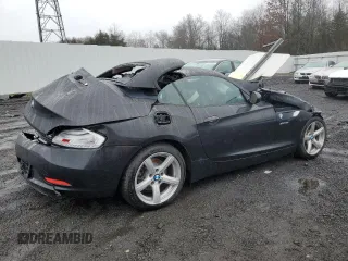2011 BMW Z4 sDrive30i with VIN WBALM5C56BE379790, listed as a Copart auction lot 80991153 with 0 mi miles and Salvage Title. Bid and sale history available at carsss.com. Image 3.