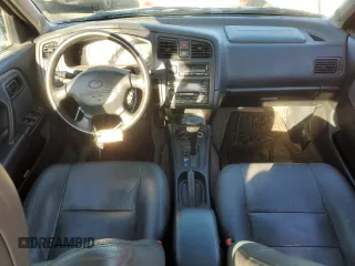 1999 Infiniti G20 z VIN JNKCP11A6XT003028, wystawiony jako Copart lot #72412504 z przebiegiem 157 279 mil mil oraz Szkody całkowita. Historia ofert i sprzedaży dostępna na DreamBid. Obrazek 8.