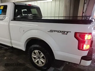 2019 Ford F-150 XL with VIN 1FTEX1EP6KKD58840, listed as a IAAI auction lot 42179075 with 169,671 mi miles. Bid and sale history available at carsss.com. Image 6.