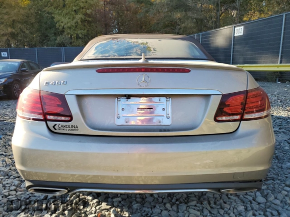 2016 Mercedes-Benz E 400 with VIN WDDKK6FF8GF334288, listed as a Copart auction lot 77405814 with 115,728 mi miles and Salvage Title. Bid and sale history available at carsss.com. Image 6.