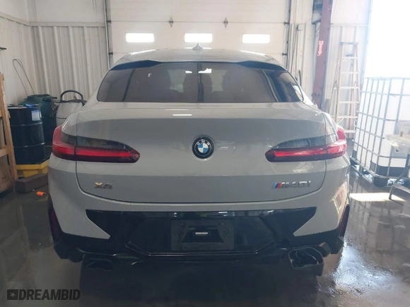2023 BMW X4 M40i with VIN 5UX43DT03P9R26280, listed as a IAAI auction lot 41318355 with 21,587 mi miles. Bid and sale history available at carsss.com. Image 16.