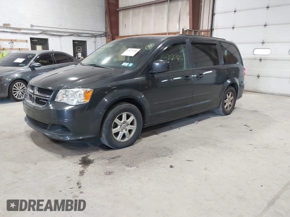 2012 Dodge Grand Caravan SXT with VIN 2C4RDGCG4CR224850, listed as a IAAI auction lot 42070300 with 177,982 mi miles and . Bid and sale history available at DreamBid. Image 2.