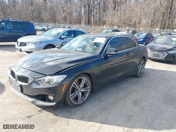 2016 BMW 4 Series 428i with VIN WBA3V7C50G5A24827, listed as a IAAI auction lot 41582906 with 90,161 mi miles. Bid and sale history available at carsss.com. Image 2.