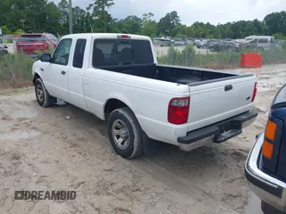 2003 Ford Ranger XL Fleet z VIN 1FTYR44V23TA10053, wystawiony jako IAAI lot #42504530 z przebiegiem 152 733 mil mil oraz . Historia ofert i sprzedaży dostępna na DreamBid. Obrazek 3.