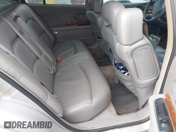 2001 Buick LeSabre Limited z VIN 1G4HR54K71U154972, wystawiony jako IAAI lot #42284313 z przebiegiem 106 793 mil mil oraz . Historia ofert i sprzedaży dostępna na DreamBid. Obrazek 8.