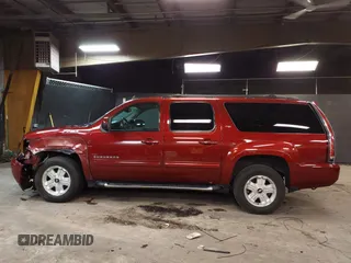 2010 Chevrolet Suburban LT z VIN 1GNUKJE32AR106197, wystawiony jako IAAI lot #42378134 z przebiegiem 106 479 mil mil oraz . Historia ofert i sprzedaży dostępna na DreamBid. Obrazek 15.
