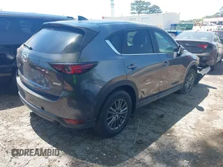 2017 Mazda CX-5 Touring with VIN JM3KFACL5H0197432, listed as a IAAI auction lot 42060117 with 1 mi miles. Bid and sale history available at carsss.com. Image 4.