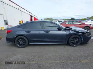 2022 Honda Civic Sport with VIN 2HGFE2F52NH531408, listed as a IAAI auction lot 41975592 with 28,198 mi miles. Bid and sale history available at carsss.com. Image 13.