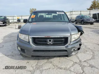 2010 Honda Ridgeline RT with VIN 5FPYK1F28AB008918, listed as a Copart auction lot 70030164 with 0 mi miles and Salvage Title. Bid and sale history available at carsss.com. Image 5.