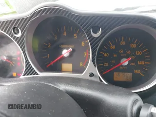 2003 Nissan 350Z Touring z VIN JN1AZ34E33T003711, wystawiony jako IAAI lot #41351191 z przebiegiem 167 503 mil mil oraz . Historia ofert i sprzedaży dostępna na DreamBid. Obrazek 7.
