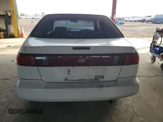 1997 Nissan Sentra XE with VIN 1N4AB41D9VC715071, listed as a Copart auction lot 84857134 with 162,357 mi miles and Salvage title. Bid and sale history available at DreamBid. Image 6.