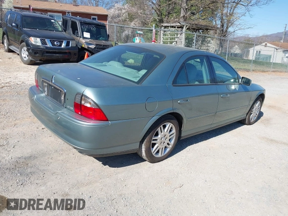 2003 Lincoln LS Sport with VIN 1LNHM87A33Y677386, listed as a IAAI auction lot 41890308 with 139,498 mi miles. Bid and sale history available at carsss.com. Image 4.
