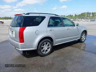 2004 Cadillac SRX with VIN 1GYDE63A740111607, listed as a IAAI auction lot 41918519 with 239,042 mi miles. Bid and sale history available at carsss.com. Image 4.