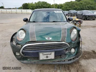 2017 MINI Hardtop 4 Door Cooper with VIN WMWXU1C57H2E18281, listed as a Copart auction lot 69714554 with 77,049 mi miles and Salvage Title. Bid and sale history available at carsss.com. Image 5.