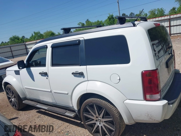 2011 Dodge Nitro Heat with VIN 1D4PT4GX9BW587284, listed as a IAAI auction lot 41998357 with 100,366 mi miles and . Bid and sale history available at DreamBid. Image 14.