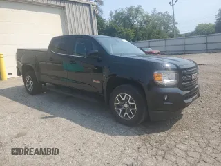 2018 GMC Canyon 4WD All Terrain w/Cloth with VIN 1GTG6CEN0J1301365, listed as a Copart auction lot 69886294 with 61,857 mi miles and Salvage Title. Bid and sale history available at carsss.com. Image 4.