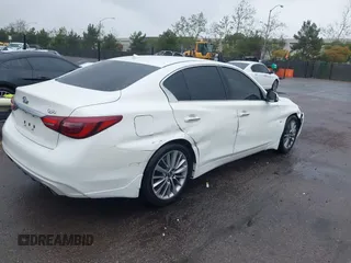 2019 Infiniti Q50 Signature Edition with VIN JN1EV7AP9KM514861, listed as a IAAI auction lot 41805236 with 58,286 mi miles and . Bid and sale history available at carsss.com. Image 4.