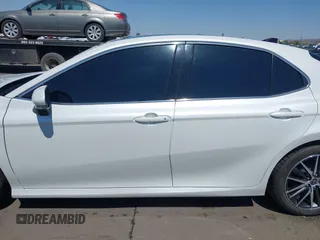 2023 Toyota Camry XLE z VIN 4T1F11AKXPU758648, wystawiony jako IAAI lot #42471815 z przebiegiem 27 714 mil mil oraz . Historia ofert i sprzedaży dostępna na DreamBid. Obrazek 14.