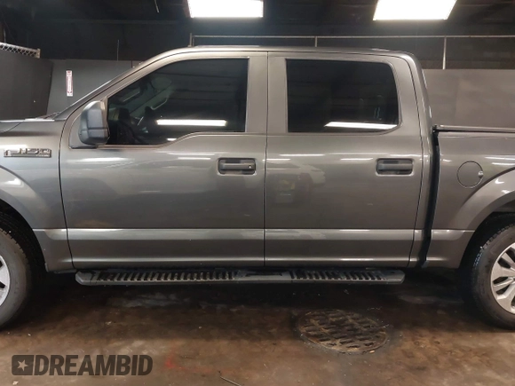 2018 Ford F-150 XL with VIN 1FTEW1EP5JFC37436, listed as a IAAI auction lot 41807561 with 133,159 mi miles and . Bid and sale history available at carsss.com. Image 14.
