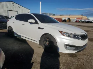 2013 Kia Optima Hybrid LX with VIN KNAGM4ADXD5043066, listed as a Copart auction lot 73050064 with 152,637 mi miles and Clean Title. Bid and sale history available at carsss.com. Image 4.