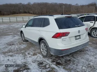 2019 Volkswagen Tiguan SE with VIN 3VV3B7AX7KM040136, listed as a IAAI auction lot 41397714 with 82,302 mi miles and . Bid and sale history available at DreamBid. Image 3.