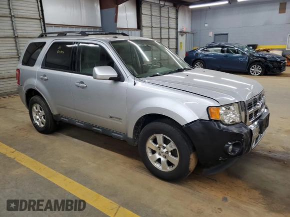 2010 Ford Escape Hybrid with VIN 1FMCU4K31AKC24086, listed as a Copart auction lot 54580895 with 194,510 mi miles and Salvage title. Bid and sale history available at DreamBid. Image 4.