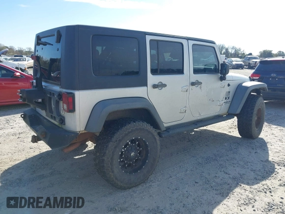 2007 Jeep Wrangler Unlimited X with VIN 1J4GB39147L199367, listed as a IAAI auction lot 40897772 with 229,309 mi miles and . Bid and sale history available at DreamBid. Image 4.