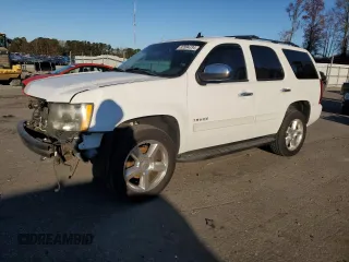 2013 Chevrolet Tahoe LS with VIN 1GNSCAE09DR340125, listed as a Copart auction lot 82894734 with 214,909 mi miles and Salvage title. Bid and sale history available at DreamBid. Image 1.