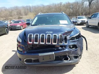 2015 Jeep Cherokee Limited with VIN 1C4PJMDS5FW649720, listed as a IAAI auction lot 42046740 with 158,147 mi miles. Bid and sale history available at carsss.com. Image 12.