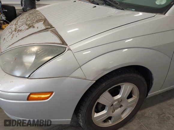 2004 Ford Focus ZX5 with VIN 3FAHP37314R110616, listed as a IAAI auction lot 42581804 with 94,252 mi miles and . Bid and sale history available at DreamBid. Image 6.