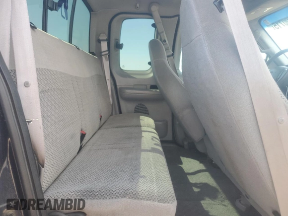 2001 Ford F-150 XL with VIN 1FTRX18L71NA27627, listed as a Copart auction lot 64190715 with 105,503 mi miles and Salvage title. Bid and sale history available at DreamBid. Image 10.