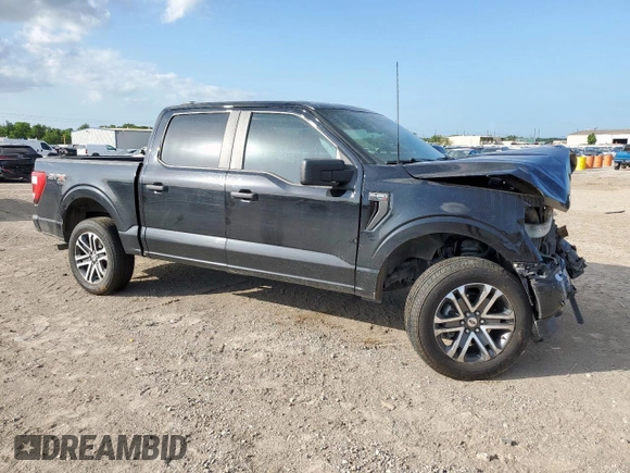 2021 Ford F-150 XL with VIN 1FTFW1E50MFB62183, listed as a Copart auction lot 60079265 with 151,203 mi miles and Salvage title. Bid and sale history available at DreamBid. Image 4.
